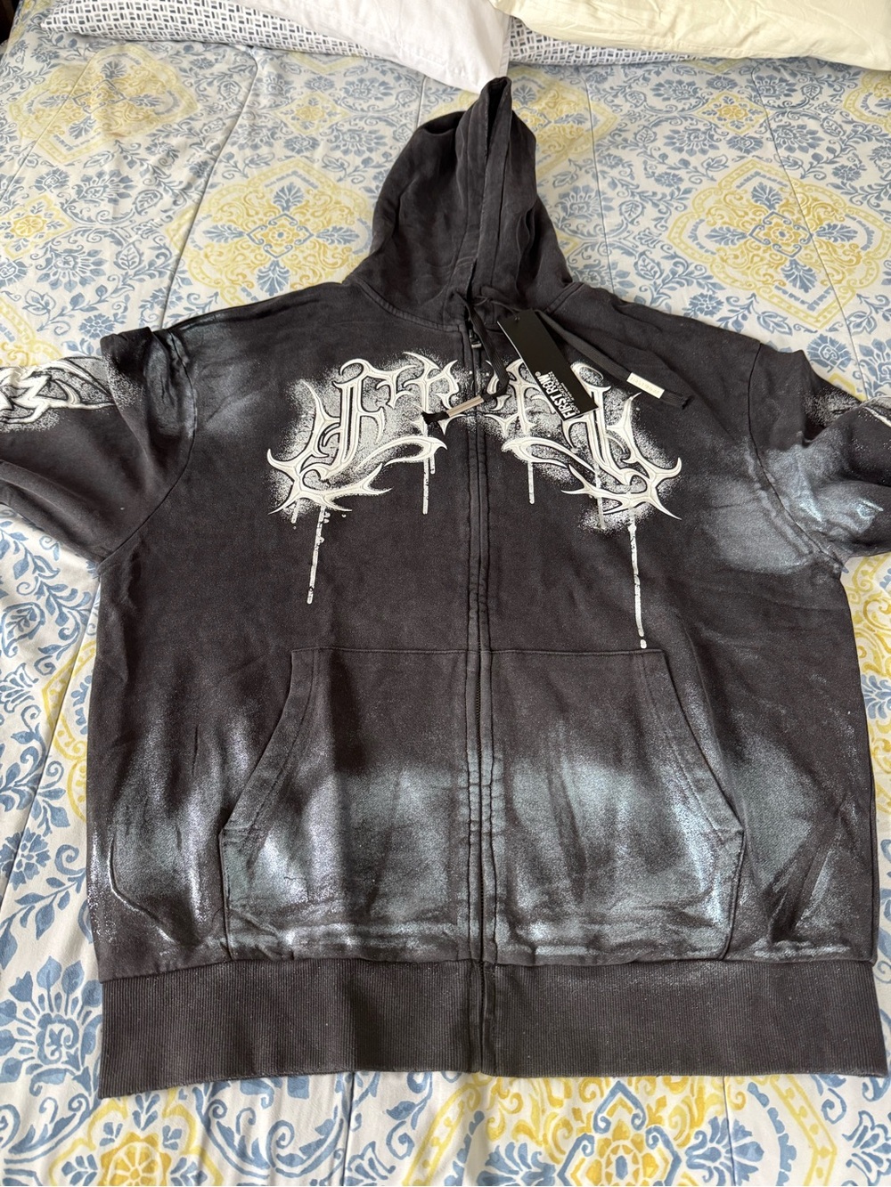 First Row Black Graphic Zip-Up Hoodie with White Script Design